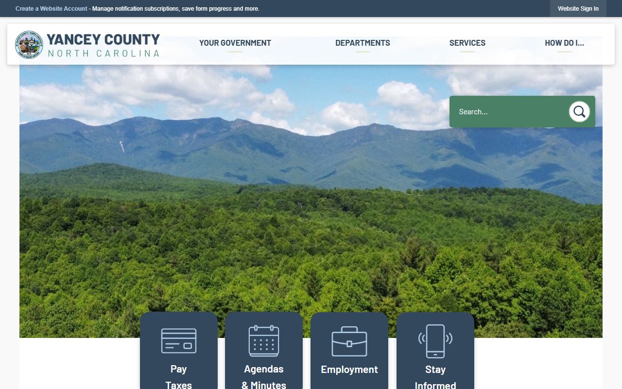 Yancey County government website showing departments and county service links